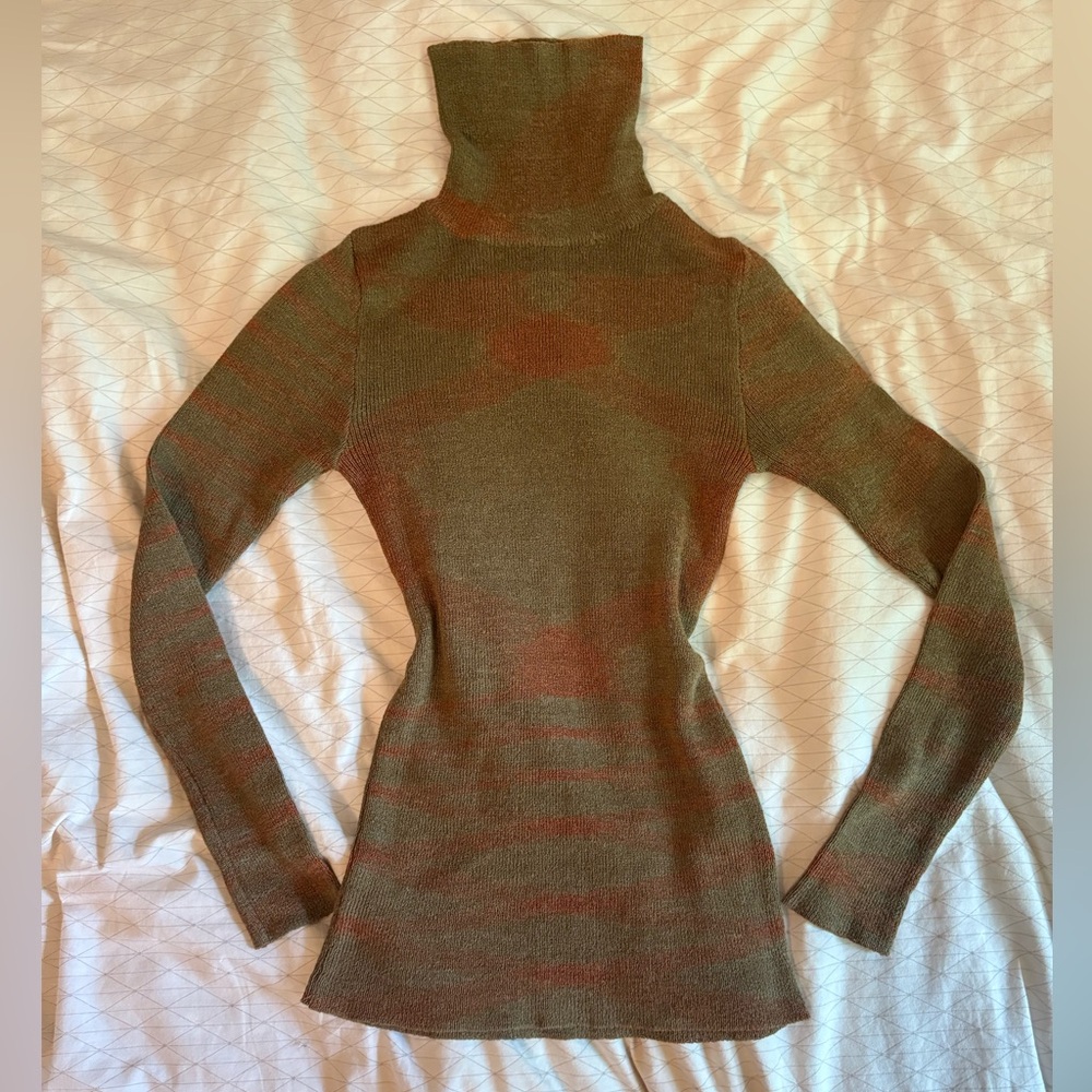 Green and burnt orange striped turtleneck knitted sweater